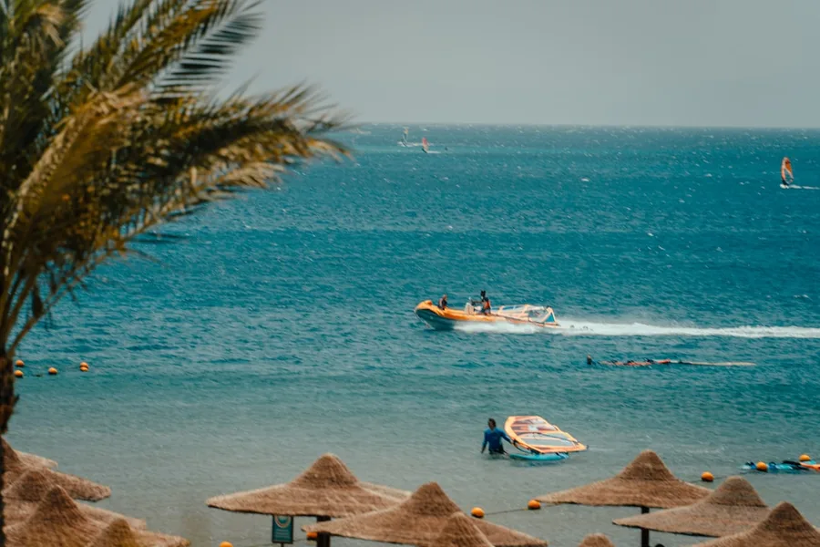 Dahab coastline versus Sharm el Sheikh crowded beach Egypt