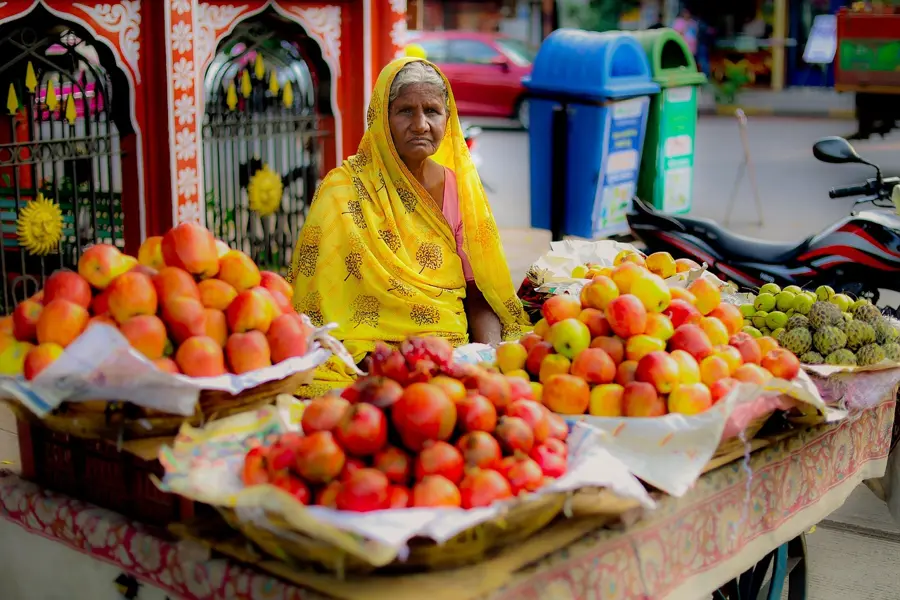 uzbek bread seller in Samarkand market
