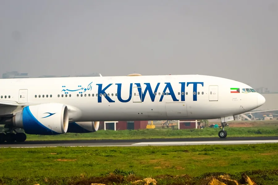 student housesitting Kuwait apartment with cat budget travel