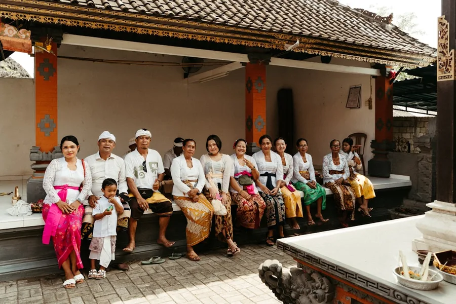 Tourists wearing sarongs at Uluwatu Temple Bali Indonesia Kotor Montenegro