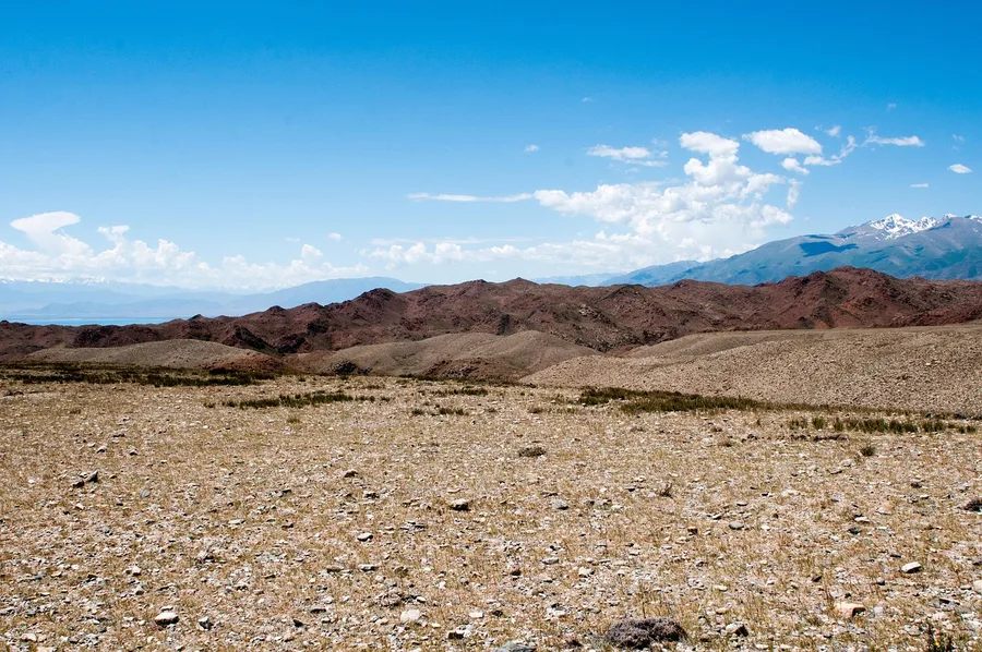 Issyk-Kul mountains shore from Karatalaa Kyrgyzstan