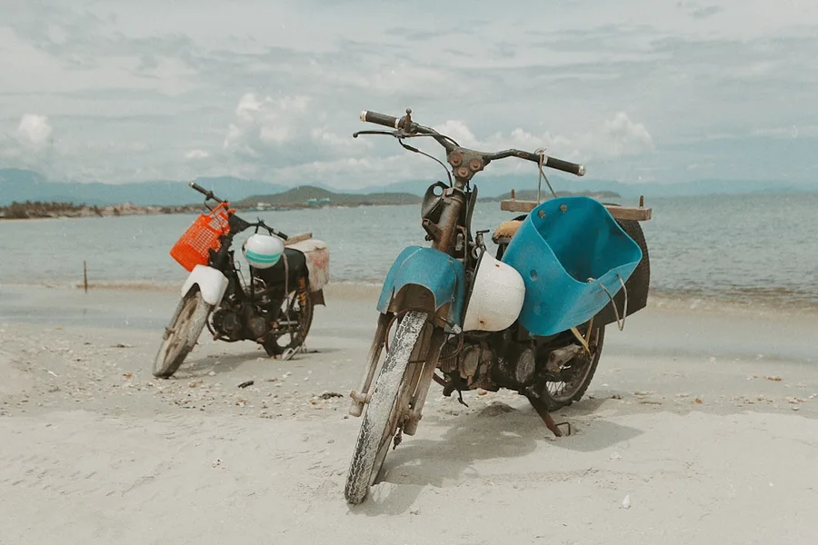 scooter on empty beach road Nha Trang Vietnam