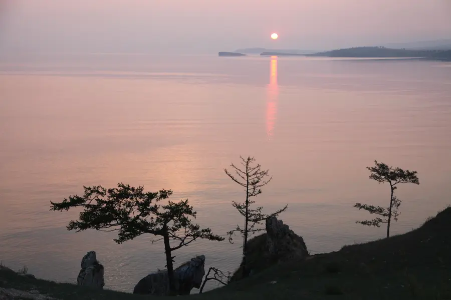 Uzury Bay Olkhon Island Baikal sunrise wooden cabin