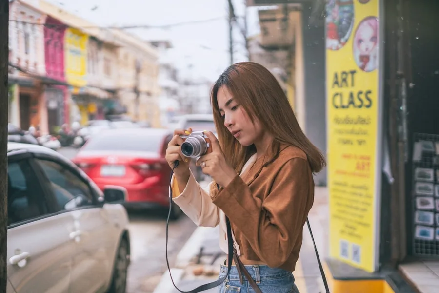 Tourist using ATM machine Phuket Thailand