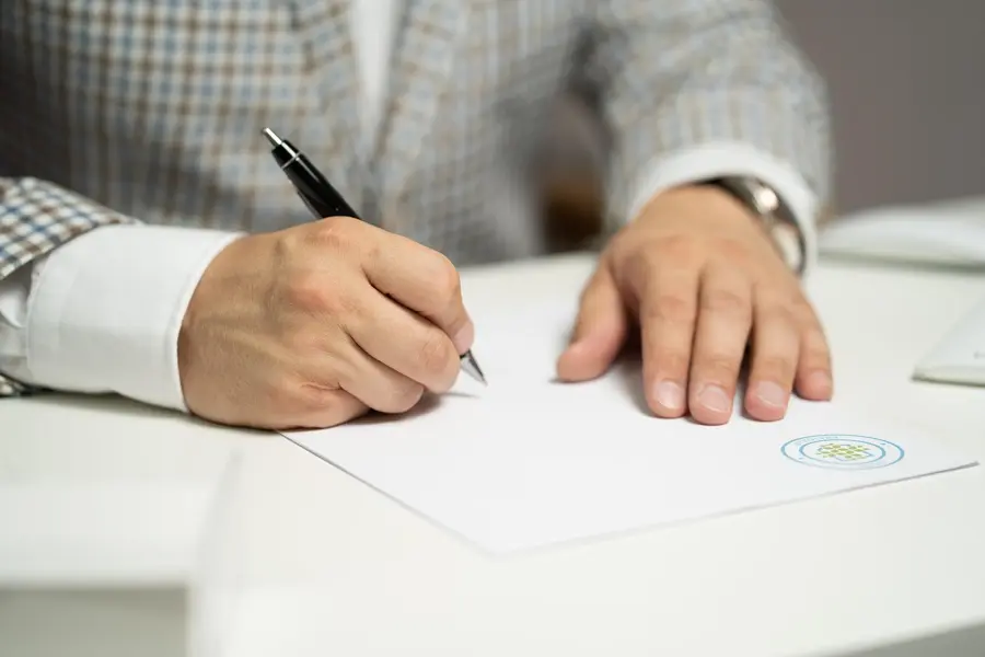 signing rental contract in Armenia documents pen