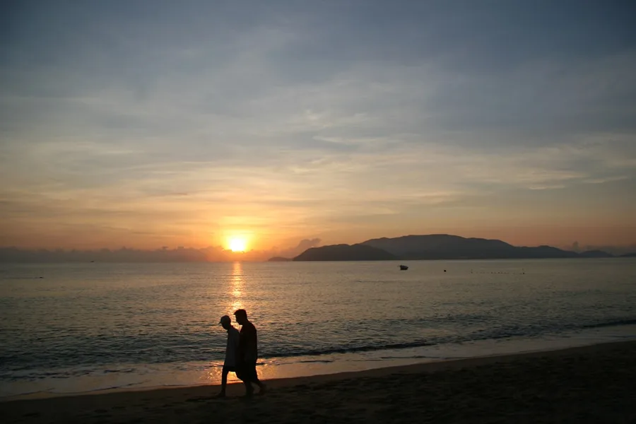 solo surfer on beach Nha Trang Vietnam
