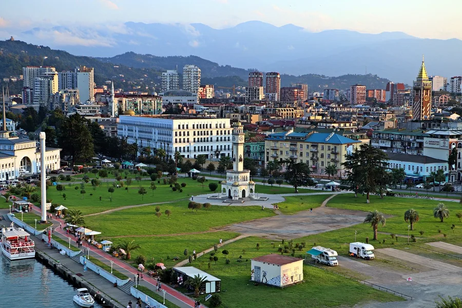 family traveling by public bus Batumi boulevard Georgia Bath UK