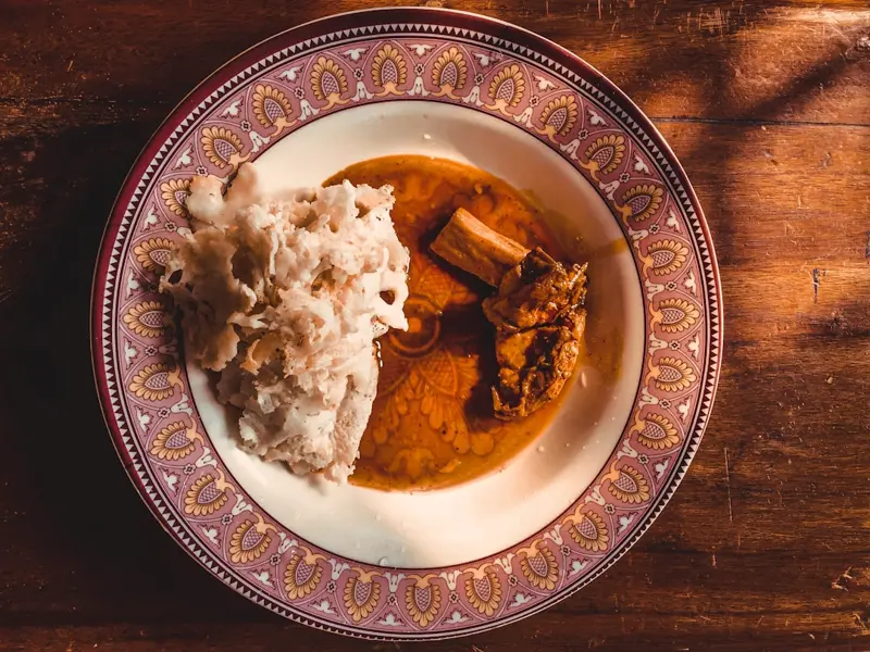 Close-up of delicious khinkal with meat broth Derbent