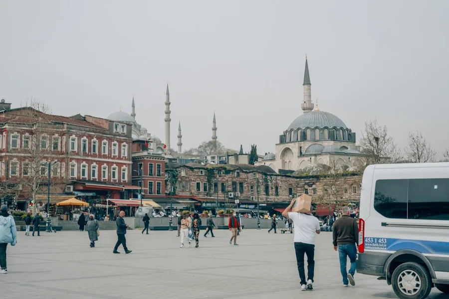 military police stopping tourists taking photos near restricted building Istanbul Turkey
