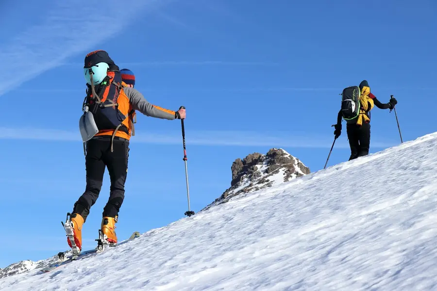 ski mountaineer with avalanche gear Caucasus backcountry