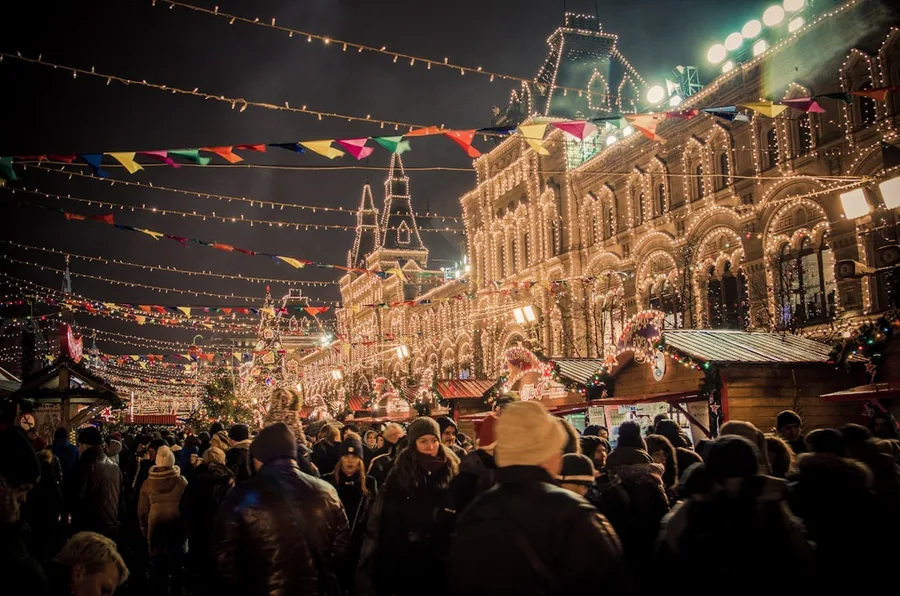 Moscow Red Square Christmas market crowded evening Russia