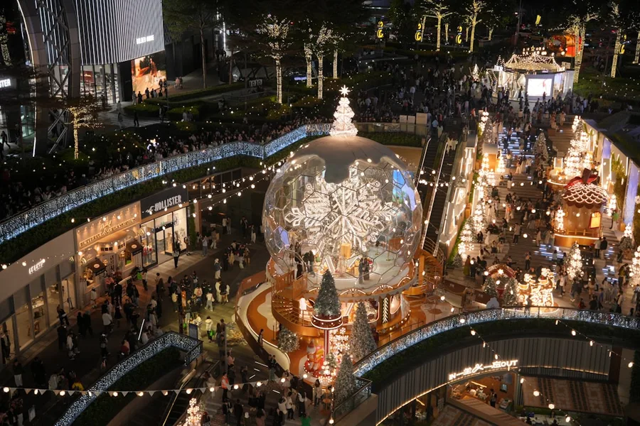 crowded luxury mall Taikoo Hui Guangzhou tourists shopping