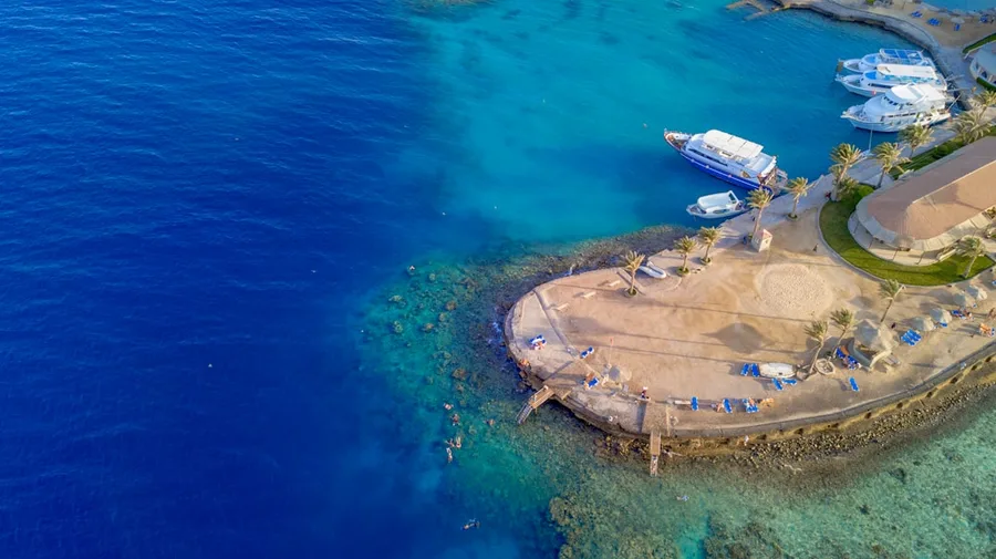 glass bottom boat tour elderly passengers Hurghada Red Sea Egypt