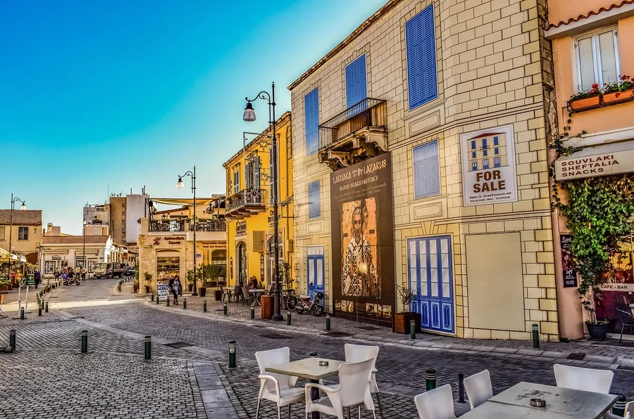 Solo female traveler checking bus timetable Larnaca Cyprus