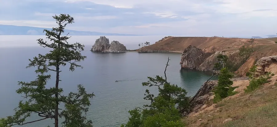 empty pebble beach of Olkhon island Lake Baikal at sunset no people