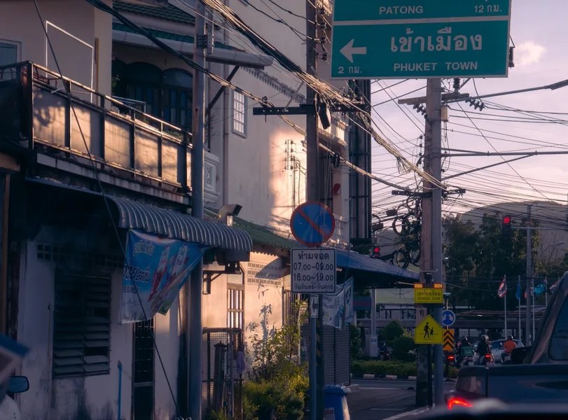 tourist police fine shirtless phuket street Thailand