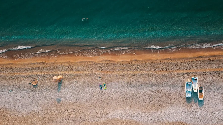 Family with drone on Kemer beach Turkey police fine
