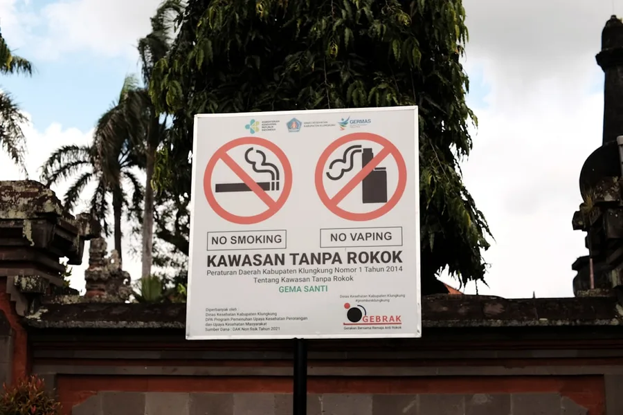 Warning signs about dress code at Uluwatu Temple Bali Indonesia Kotor Montenegro