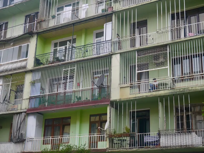cozy furnished studio apartment interior in Batumi with high-speed wifi router visible